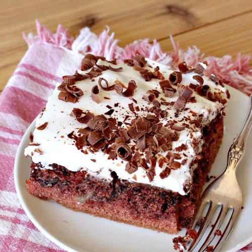 Chocolate Caramel Marshmallow Cake | this spectacular #chocolate #cake has a #caramel-like #praline filling & #marshmallow frosting. It's to die for! Terrific for company & #holidays like #MothersDay or #FathersDay. #toffee #ChocolateCake #HolidayDessert #MothersDayDessert #FathersDayDessert #ChocolateCaramelMarshmallowCake #ChocolateDessert #CaramelDessert #ToffeeDessert #MarshmallowDessert