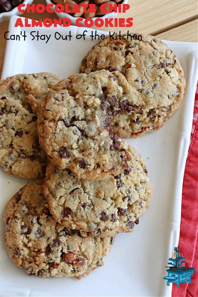 Chocolate Chip Almond Cookies | Can't Stay Out of the Kitchen | these fantastic #cookies are divine! They include 2 bags of miniature #ChocolateChips & chopped #almonds. They're crunchy, chocolaty and mammoth-sized. Wonderful for #tailgating or office parties, potlucks, soccer or hockey practice for your kids or backyard BBQs. Every bite is just perfect! #dessert #ChocolateDessert #chocolate #AlmondDessert #ChristmasCookieExchange #ChocolateChipAlmondCookies