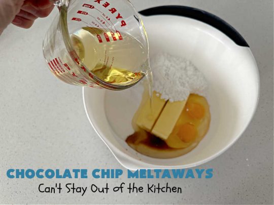 Chocolate Chip Meltaways | Can't Stay Out of the Kitchen | Prepare yourself for the ultimate #MeltInYourMouthCookie! These lovely #SugarCookies include two bags of #ChocolateChips so they're #chocolaty as well as decadent & just dissolve in your mouth! Every bite will cure your sweet tooth cravings. Perfect #dessert for #tailgating parties, potlucks or a #ChristmasCookieExchange. #chocolate #ChocolateDessert #ChocolateChipMeltaways