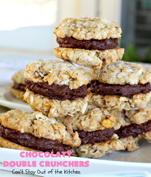 Chocolaty Double Crunchers | Can't Stay Out of the Kitchen | this scrumptious #cookie #recipe is to die for! The cookies contain #oatmeal, #CornFlakes & #coconut. The #chocolate frosting is made from #ChocolateChips & #CreamCheese. Absolutely mouthwatering #dessert for #tailgating, potlucks or #ChristmasCookieExchanges. #ChocolateDessert #WhoopiePie #OatmealWhoopiePie#ChocolatyDoubleCrunchers #SandwichCookie #OatmealSandwichCookie