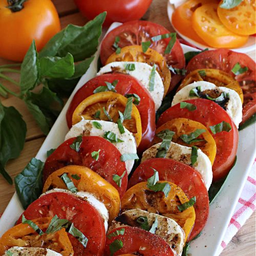 Colorful Tomato Mozzarella Salad | Can't Stay Out of the Kitchen | this light & refreshing #caprese-style #salad is elegant & beautiful enough for company dinners, but so easy you can whip it up for family meals. Every bite is so palate pleasing. It's great for a #potluck or #BackyardBarbecue too. #GlutenFree #tomatoes #basil #Mozzarella #TomatoMozzarellaSalad #ColorfulTomatoMozzarellaSalad