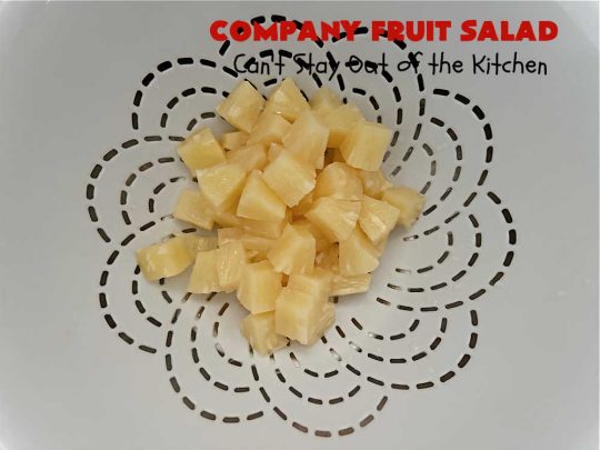 Company Fruit Salad | Can't Stay Out of the Kitchen | This delicious #FruitSalad will rock your world! It's made with #pears, #pineapple, #grapes #MandarinOranges & #apples & uses a very easy #CreamCheese #SaladDressing to mix it all together. It's the perfect #salad for company or #holiday dinners, but simple enough to whip up for everyday meals. Everyone will want seconds! #GlutenFree #CompanyFruitSalad