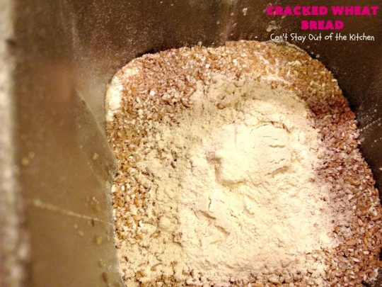 Cracked Wheat Bread | Can't Stay Out of the Kitchen | this delicious #WholeWheatBread includes honey & #CrackedWheat. It's so easy since it's made in the #breadmaker. Wonderful #bread to serve with soup or chili. We also like to eat it for #breakfast served with jellies or jam. #HomemadeBread #CrackedWheatBread #BreadmakerBread