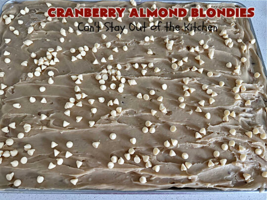 Cranberry Almond Blondies | Can't Stay Out of the Kitchen | these lovely #brownies simply explode with flavor. #AlmondExtract & #almonds in the #brownie & the #icing make them sing! #BrownedButter, #bananas, #DriedCranberries & #VanillaChips sweeten up the #blondies so they're rich, decadent & irresistible. Perfect for #holiday parties, #tailgating & #potlucks. #CranberryAlmondBlondies