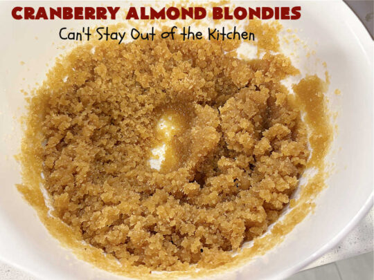 Cranberry Almond Blondies | Can't Stay Out of the Kitchen | these lovely #brownies simply explode with flavor. #AlmondExtract & #almonds in the #brownie & the #icing make them sing! #BrownedButter, #bananas, #DriedCranberries & #VanillaChips sweeten up the #blondies so they're rich, decadent & irresistible. Perfect for #holiday parties, #tailgating & #potlucks. #CranberryAlmondBlondies