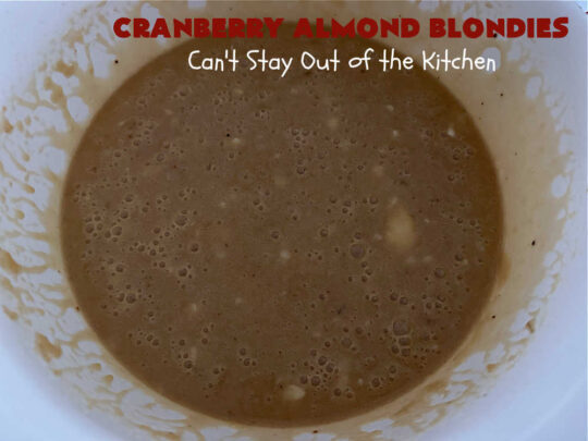 Cranberry Almond Blondies | Can't Stay Out of the Kitchen | these lovely #brownies simply explode with flavor. #AlmondExtract & #almonds in the #brownie & the #icing make them sing! #BrownedButter, #bananas, #DriedCranberries & #VanillaChips sweeten up the #blondies so they're rich, decadent & irresistible. Perfect for #holiday parties, #tailgating & #potlucks. #CranberryAlmondBlondies