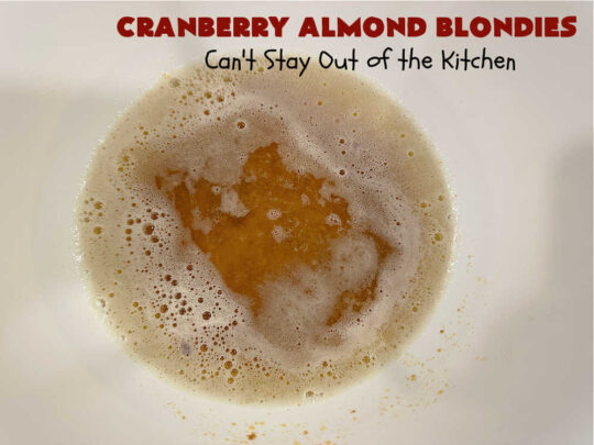 Cranberry Almond Blondies | Can't Stay Out of the Kitchen | these lovely #brownies simply explode with flavor. #AlmondExtract & #almonds in the #brownie & the #icing make them sing! #BrownedButter, #bananas, #DriedCranberries & #VanillaChips sweeten up the #blondies so they're rich, decadent & irresistible. Perfect for #holiday parties, #tailgating & #potlucks. #CranberryAlmondBlondies