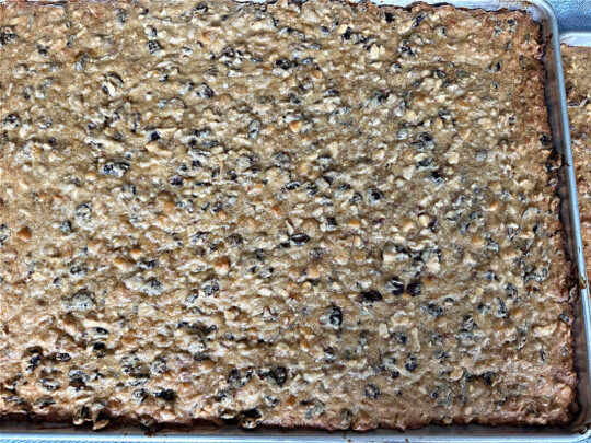 Cranberry Almond Blondies | Can't Stay Out of the Kitchen | these lovely #brownies simply explode with flavor. #AlmondExtract & #almonds in the #brownie & the #icing make them sing! #BrownedButter, #bananas, #DriedCranberries & #VanillaChips sweeten up the #blondies so they're rich, decadent & irresistible. Perfect for #holiday parties, #tailgating & #potlucks. #CranberryAlmondBlondies