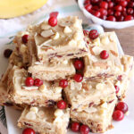 Cranberry Almond Blondies | Can't Stay Out of the Kitchen | these lovely #brownies simply explode with flavor. #AlmondExtract & #almonds in the #brownie & the #icing make them sing! #BrownedButter, #bananas, #DriedCranberries & #VanillaChips sweeten up the #blondies so they're rich, decadent & irresistible. Perfect for #holiday parties, #tailgating & #potlucks. #CranberryAlmondBlondies
