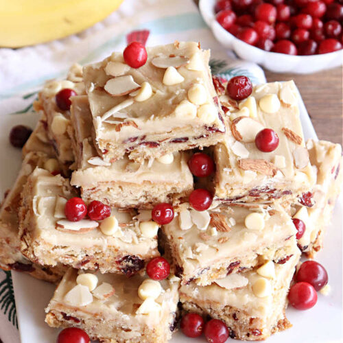 Cranberry Almond Blondies | Can't Stay Out of the Kitchen | these lovely #brownies simply explode with flavor. #AlmondExtract & #almonds in the #brownie & the #icing make them sing! #BrownedButter, #bananas, #DriedCranberries & #VanillaChips sweeten up the #blondies so they're rich, decadent & irresistible. Perfect for #holiday parties, #tailgating & #potlucks. #CranberryAlmondBlondies