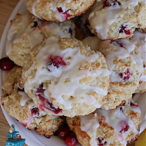 Cranberry Lemon Biscuits | Can't Stay Out of the Kitchen | these delicious sweet #biscuits are terrific for a #Thanksgiving or #Christmas #holiday #breakfast or #brunch menu. They're filled with fresh #cranberries, #LemonZest & #LemonYogurt. The #icing includes #LemonJuice & #Lemon zest. If you enjoy a sweet treat with your morning #coffee, #CranberryLemonBiscuits are the perfect accompaniment.