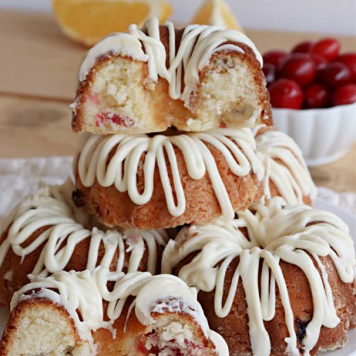 Cranberry Orange Tea Cakes | Can't Stay Out of the Kitchen | These delightful #TeaCakes include fresh #cranberries, grated #OrangeZest & #walnuts. The icing also includes #orange zest. This is the perfect #dessert to bring to #holiday & #Christmas parties. Everyone will swoon over these delicious treats. #HolidayDessert #CranberryDessert #CranberryOrangeTeaCakes