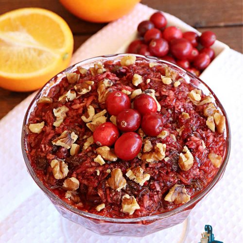 Cranberry Relish | Can't Stay Out of the Kitchen | this easy peasy #recipe is perfect for #turkey, #ham or #PorkTenderloin. While this #appetizer is marvelous for #holidays like #Thanksgiving or #Christmas, if you freeze fresh #cranberries you can enjoy it throughout the year. We serve it over #HomemadeRolls. #raisins #LemonZest #OrangeJuice #relish #CranberryRelish