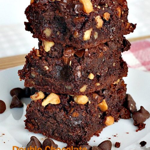 Double Chocolate Macadamia Brownies | Can't Stay Out of the Kitchen | these fabulous #brownies use 2 bags of #chocolate chips. One is melted & the other is added into the batter & on top with #macadamianuts. Amazing #dessert. #chocolate