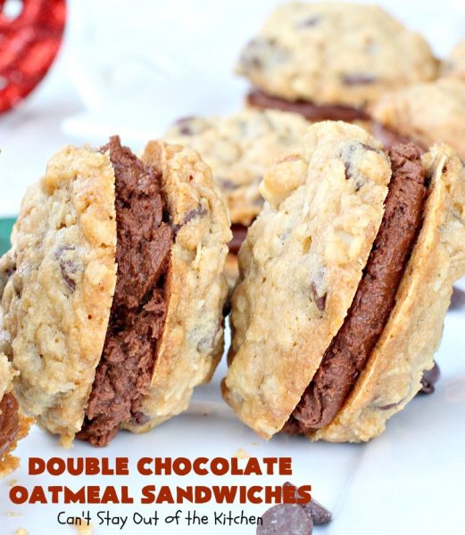 Double Chocolate Oatmeal Cookies | Can't Stay Out of the Kitchen | these spectacular #OatmealCookies feature #ChocolateChips in the #cookies and a #chocolate #fudge frosting sandwiched between to die for! Amazing #dessert for #holiday #ChristmasCookie baking. #ChristmasCookieExchange #FallBaking #DoubleChocolateOatmealSandwiches #ChocolateFudgeFrosting #HolidayDessert