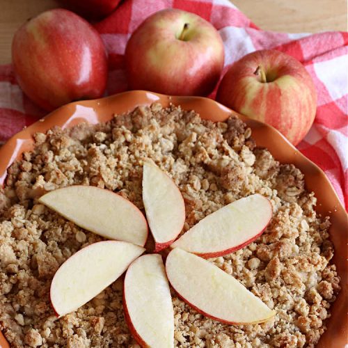 Dutch Apple Pie | Can't Stay Out of the Kitchen | This delicious #ApplePie #recipe is not like traditional #apple #pie with a #HomemadePieCrust. This one uses a crust made with #oatmeal & #BrownSugar. Instead of #cinnamon, this #dessert is flavored with #VanillaExtract. It is sort of the "LazyDay's" way of making #ApplePie! So mouthwatering & delicious & terrific for #holiday or company dinners. #Dutch #DutchApplePie