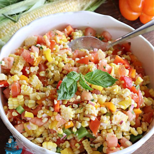 Fresh Corn and Tomato Salad | Can't Stay Out of the Kitchen | this is a delightful #summer #salad #recipe using fresh #CornOnTheCob, #tomatoes & #BellPeppers. The homemade #SaladDressing is easy to whip up and seasons the #salad perfectly. Excellent option for #picnics, #BackyardBarbecues, #FamilyReunions or #potlucks since it can be made in advance. #vegan #GlutenFree #basil #CornSalad #parsley #FreshCornAndTomatoSalad