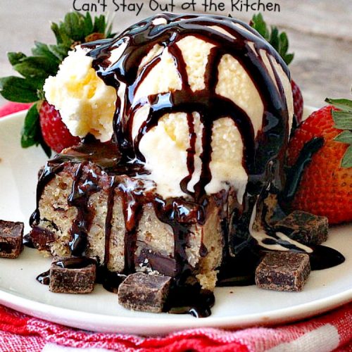 Fudge Frosted Chunky Monkey Brownies | Can't Stay Out of the Kitchen | These heavenly #brownies have #chocolate chunks in the batter & #fudge frosting on top. This addictive #dessert has triple the chocolate threat when you add ice cream & #Ghirardelli chocolate sauce on top!