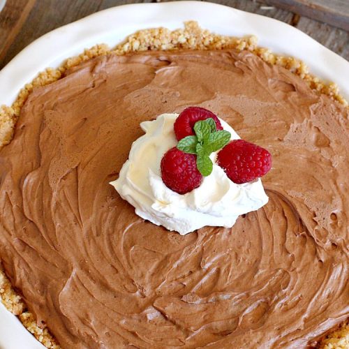 Fudge Pie | Can't Stay Out of the Kitchen | this amazing #ChocolatePie is rich, decadent and absolutely divine! Every bite will have you drooling. It's terrific for company or #holidays like #Easter or #MothersDay. #Pie #FudgePie #chocolate #HolidayDessert #EasterDessert #MothersDayDessert #FudgeDessert