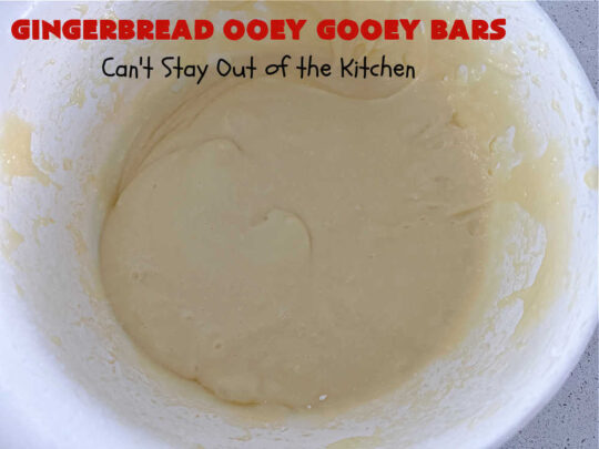 Gingerbread Ooey Gooey Bars | Can't Stay Out of the Kitchen | these delicious bar-type #cookies have all the classic flavors of #OoeyGooeyBars but with a #Gingerbread flavor instead! A #GingerbreadCakeMix is used for the crust layer. It's topped with a #CheeseCake layer, #WhiteChocolateChips & sprinkled with #PowderedSugar. Every bite will knock your socks off! Great for #Christmas or #holiday parties, #tailgating or a #ChristmasCookieExchange. #dessert #GingerbreadDessert #GingerbreadOoeyGooeyBars