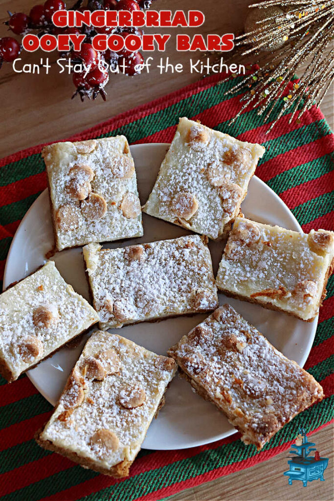 Gingerbread Ooey Gooey Bars | Can't Stay Out of the Kitchen | these delicious bar-type #cookies have all the classic flavors of #OoeyGooeyBars but with a #Gingerbread flavor instead! A #GingerbreadCakeMix is used for the crust layer. It's topped with a #CheeseCake layer, #WhiteChocolateChips & sprinkled with #PowderedSugar. Every bite will knock your socks off! Great for #Christmas or #holiday parties, #tailgating or a #ChristmasCookieExchange. #dessert #GingerbreadDessert #GingerbreadOoeyGooeyBars