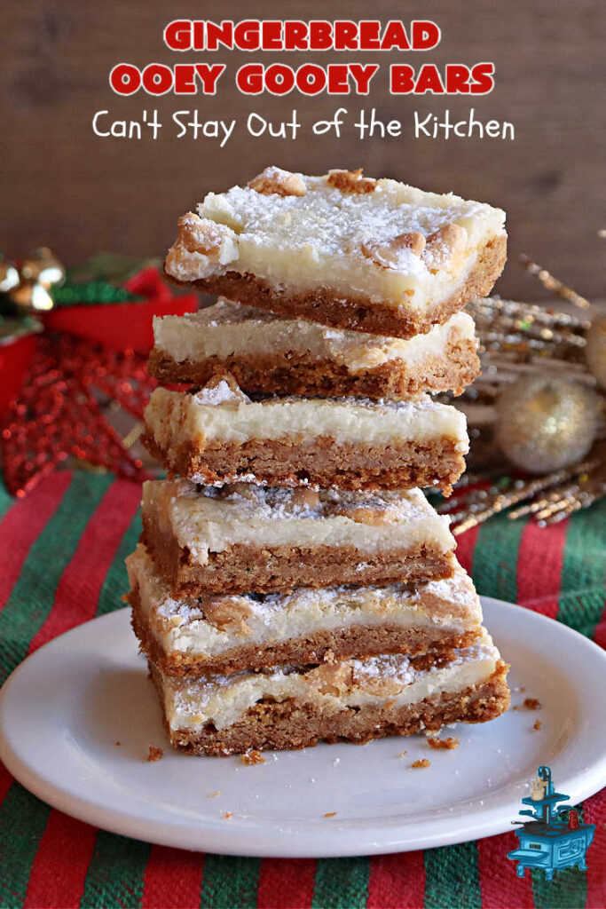 Gingerbread Ooey Gooey Bars | Can't Stay Out of the Kitchen | these delicious bar-type #cookies have all the classic flavors of #OoeyGooeyBars but with a #Gingerbread flavor instead! A #GingerbreadCakeMix is used for the crust layer. It's topped with a #CheeseCake layer, #WhiteChocolateChips & sprinkled with #PowderedSugar. Every bite will knock your socks off! Great for #Christmas or #holiday parties, #tailgating or a #ChristmasCookieExchange. #dessert #GingerbreadDessert #GingerbreadOoeyGooeyBars