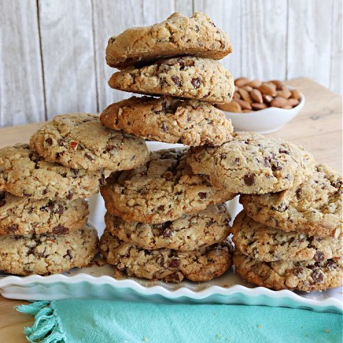 Gluten Free Chocolate Chip Almond Cookies | Can't Stay Out of the Kitchen | You'll never be able to tell these are #GlutenFree #cookies! They're filled with #almonds & #ChocolateChips & made with #Krusteaz GF flour. Excellent for #tailgating, potlucks, #HolidayBaking or a #ChristmasCookieExchange. #holiday #chocolate #dessert #GlutenFreeDessert #GlutenFreeChocolateChipAlmondCookies