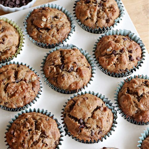 Gluten Free Chocolate Chip Banana Muffins | Can't Stay Out of the Kitchen | You'll never believe you're eating #GlutenFree #muffins with this #recipe! These #BreakfastMuffins have great texture & taste. In fact, they're so drool-worthy you'll be swooning from the first bite. #walnuts #cinnamon #bananas #chocolate #GlutenFreeFlour #ChocolateChips #holiday #breakfast #HolidayBreakfast #Thanksgiving #Christmas #NewYearsDay #GlutenFreeChocolateChipBananaMuffins