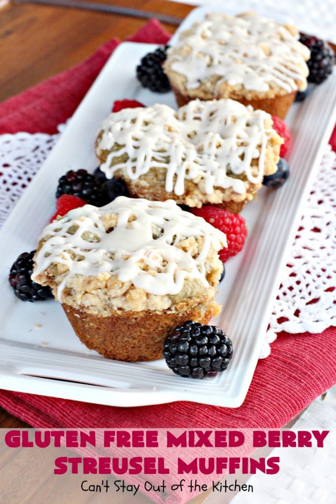 Gluten Free Mixed Berry Streusel Muffins | Can't Stay Out of the Kitchen | these fantastic #muffins are filled with #blueberries, #raspberries, #blackberries & #strawberries. They're topped with a delicious #walnut streusel & iced with a vanilla glaze. They make up one mouthwatering #muffin for a weekend, company or #holiday #breakfast. #GlutenFree #GlutenFreeMuffins #GlutenFreeMixedBerryStreuselMuffins