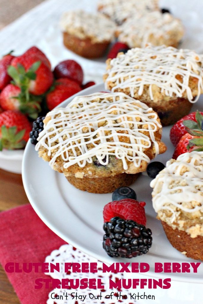 Gluten Free Mixed Berry Streusel Muffins | Can't Stay Out of the Kitchen | these fantastic #muffins are filled with #blueberries, #raspberries, #blackberries & #strawberries. They're topped with a delicious #walnut streusel & iced with a vanilla glaze. They make up one mouthwatering #muffin for a weekend, company or #holiday #breakfast. #GlutenFree #GlutenFreeMuffins #GlutenFreeMixedBerryStreuselMuffins