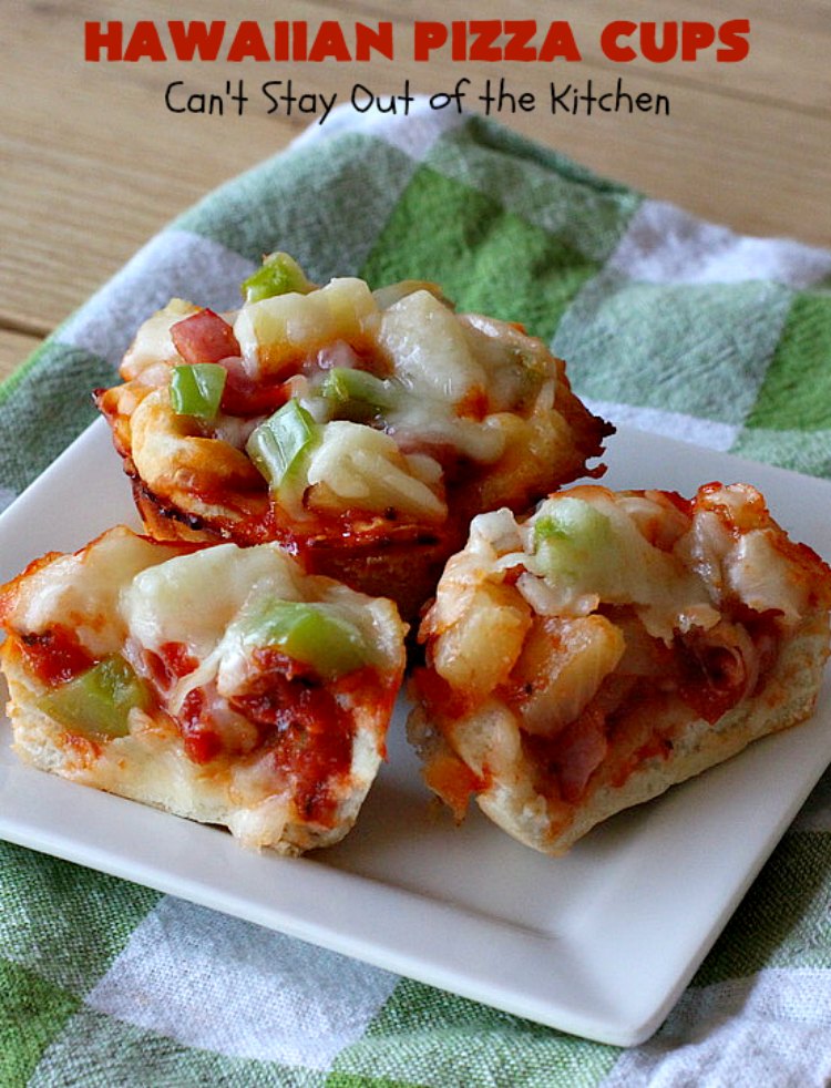 Hawaiian Pizza Cups | Can't Stay Out of the Kitchen | these fantastic miniature #pizzas are the best #appetizer of choice for #tailgating parties or the #SuperBowl! They're filled with spaghetti sauce, #ham, #pineapple & green bell pepper. Every bite is so mouthwatering, you'll be fighting others for the last one! #MozzarellaCheese #PillsburyRefrigeratedBiscuits #MiniaturePizzas #HawaiianPizzaCups