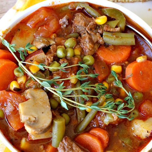 Herbed Beef Stew | Can't Stay Out of the Kitchen | our company raved over this #BeefStew. It's hearty, filling & so satisfying. It's chocked full of #potatoes, #carrots, #GreenBeans, #Corn, #Peas, #Tomatoes & #Mushrooms. Absolutely delicious! #Beef #GlutenFree #HerbedBeefStew #CompanyBeefStew