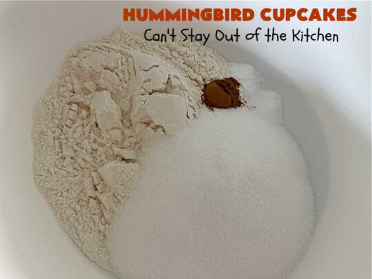 Hummingbird Cupcakes | Can't Stay Out of the Kitchen | Prepare to drool over every bite of these spectacular #cupcakes. #Walnuts, #cinnamon, #bananas #pineapple & a #CreamCheese #icing makes this #dessert rock! #HummingbirdCupcakes are just as amazing as #HummingbirdCake! #cake #HummingbirdDessert