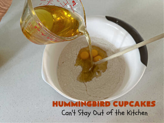 Hummingbird Cupcakes | Can't Stay Out of the Kitchen | Prepare to drool over every bite of these spectacular #cupcakes. #Walnuts, #cinnamon, #bananas #pineapple & a #CreamCheese #icing makes this #dessert rock! #HummingbirdCupcakes are just as amazing as #HummingbirdCake! #cake #HummingbirdDessert