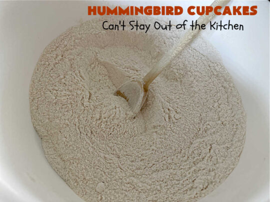 Hummingbird Cupcakes | Can't Stay Out of the Kitchen | Prepare to drool over every bite of these spectacular #cupcakes. #Walnuts, #cinnamon, #bananas #pineapple & a #CreamCheese #icing makes this #dessert rock! #HummingbirdCupcakes are just as amazing as #HummingbirdCake! #cake #HummingbirdDessert