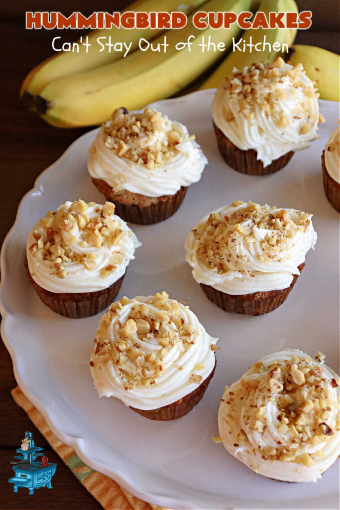 Hummingbird Cupcakes | Can't Stay Out of the Kitchen | Prepare to drool over every bite of these spectacular #cupcakes. #Walnuts, #cinnamon, #bananas #pineapple & a #CreamCheese #icing makes this #dessert rock! #HummingbirdCupcakes are just as amazing as #HummingbirdCake! #cake #HummingbirdDessert