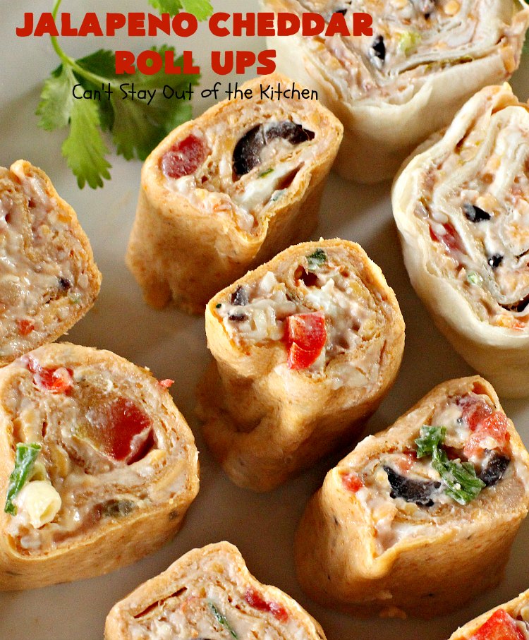 Jalapeno Cheddar Roll Ups | Can't Stay Out of the Kitchen | these fantastic #TexMex #appetizers are terrific for #tailgating, #NewYearsEve or #SuperBowl parties. Filled with #refriedbeans, #chilies, #olives, & lots of #cheese.