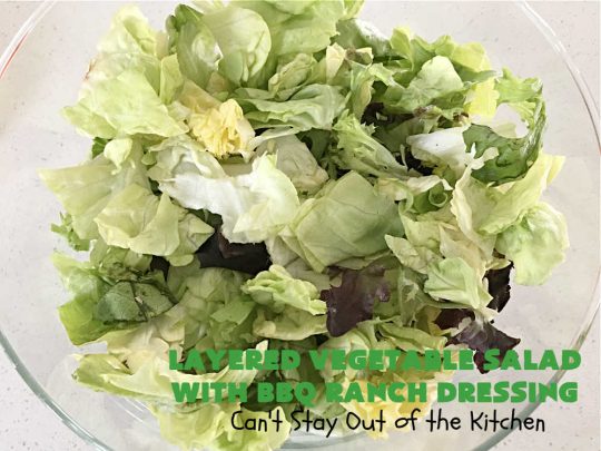 Layered Vegetable Salad with BBQ Ranch Dressing is spectacular! This amazing #salad uses all kinds of fresh #veggies, plus #bacon & two kinds of #cheese: #Cheddar & #MontereyJack. The #BBQRanchDressing is what gives the #recipe such amazing flavor. This #LayeredSalad is terrific for company or #holiday dinners & is #GlutenFree. #eggs #LayeredVegetableSaladWith BBQRanchDressing