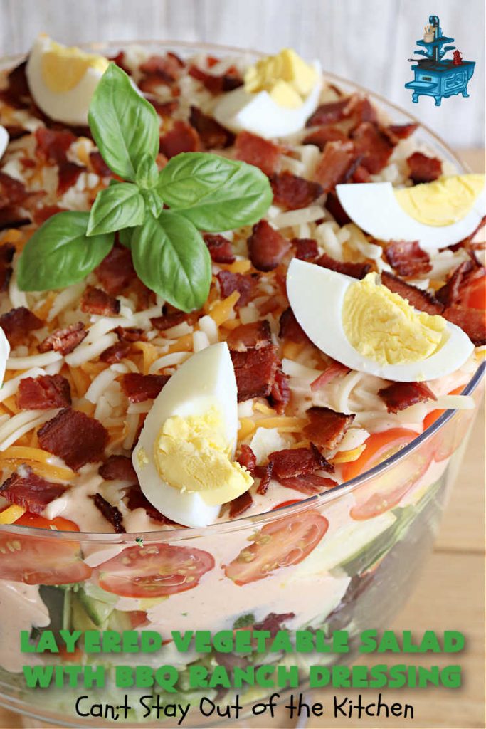 Layered Vegetable Salad with BBQ Ranch Dressing is spectacular! This amazing #salad uses all kinds of fresh #veggies, plus #bacon & two kinds of #cheese: #Cheddar & #MontereyJack. The #BBQRanchDressing is what gives the #recipe such amazing flavor. This #LayeredSalad is terrific for company or #holiday dinners & is #GlutenFree. #eggs #LayeredVegetableSaladWith BBQRanchDressing Layered Vegetable Salad with BBQ Ranch Dressing is spectacular! This amazing #salad uses all kinds of fresh #veggies, plus #bacon & two kinds of #cheese: #Cheddar & #MontereyJack. The #BBQRanchDressing is what gives the #recipe such amazing flavor. This #LayeredSalad is terrific for company or #holiday dinners & is #GlutenFree. #eggs #LayeredVegetableSaladWith BBQRanchDressing