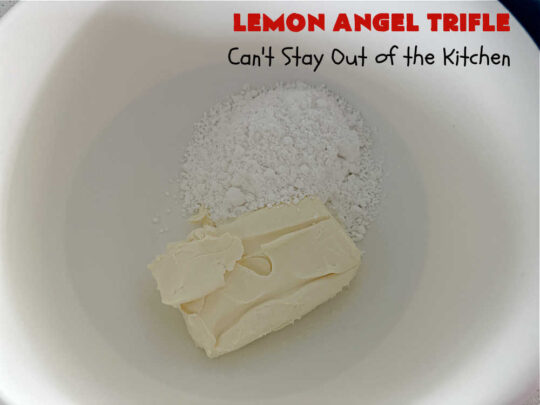 Lemon Angel Trifle | Can't Stay Out of the Kitchen | Prepare to have your socks knocked off over every delicious bite of this #lemon-flavored #trifle #dessert. It's a super easy #5IngredientRecipe that can be whipped up in 10 minutes. Your company will be drooling over every bite. #LemonDessert #CreamCheese #AngelFoodCake #LemonAngelTrifle