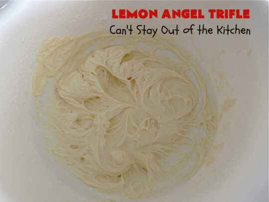 Lemon Angel Trifle | Can't Stay Out of the Kitchen | Prepare to have your socks knocked off over every delicious bite of this #lemon-flavored #trifle #dessert. It's a super easy #5IngredientRecipe that can be whipped up in 10 minutes. Your company will be drooling over every bite. #LemonDessert #CreamCheese #AngelFoodCake #LemonAngelTrifle