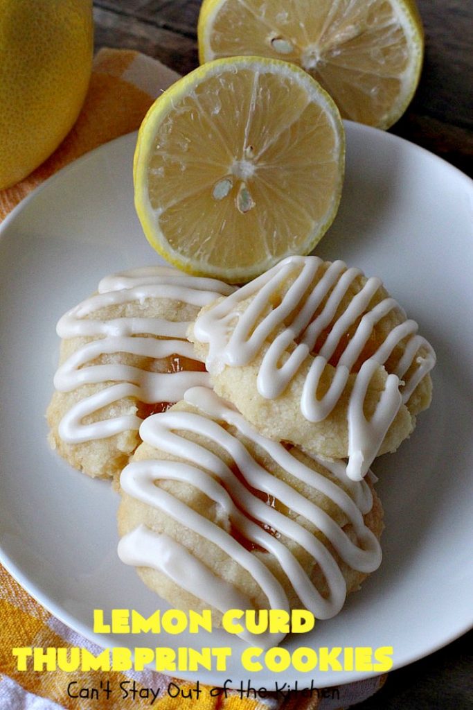Lemon Curd Thumbprint Cookies | Can't Stay Out of the Kitchen | these delectable #thumbprintcookies are terrific for the #holidays & #Christmas #baking. #LemonCurd gives them a little bite & the vanilla icing on top makes them sweetly heavenly. #cookies #dessert #lemon #LemonDessert #HolidayDessert #ChristmasDessert #ChristmasCookieExchange #ChristmasCookie