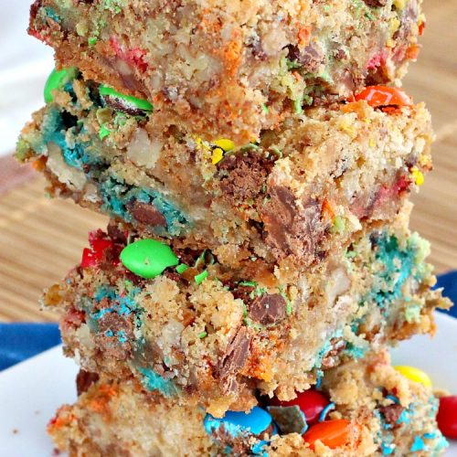 M&M Toffee Brownies | Can't Stay Out of the Kitchen | these #brownies are nothing short of sensational! They're filled with #MMs, #coconut, #pecans & #HeathEnglishToffeeBits. Terrific for #tailgating parties, potlucks, backyard BBQs & summer #holiday fun like #FourthOfJuly. #MMDessert #chocolate #HolidayDessert #ToffeeDessert #toffee #ChocolateDessert