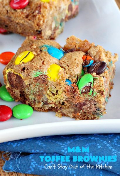 M&M Toffee Brownies | Can't Stay Out of the Kitchen | these #brownies are nothing short of sensational! They're filled with #MMs, #coconut, #pecans & #HeathEnglishToffeeBits. Terrific for #tailgating parties, potlucks, backyard BBQs & summer #holiday fun like #FourthOfJuly. #MMDessert #chocolate #HolidayDessert #ToffeeDessert #toffee #ChocolateDessert