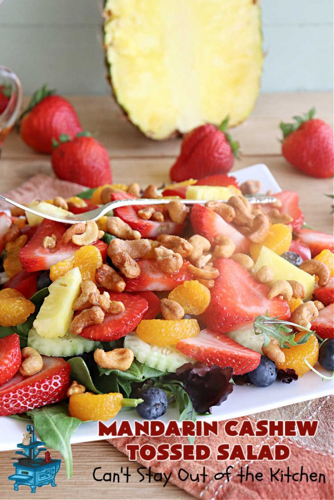 Mandarin Cashew Tossed Salad | Can't Stay Out of the Kitchen | this is a fantastic #TossedSalad for company or #holiday dinners. The #salad includes #blueberries #MandarinOrangeSegments, #cashews, #pineapple & #strawberries in a #HoneyLimeDressing. It's festive & beautiful along with being #healthy, #vegan & #GlutenFree. #MandarinCashewTossedSalad