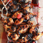 Maple Glazed Chicken Wings | Can't Stay Out of the Kitchen | Prepare to lick your chops after one bite of these amazing #ChickenWings. They're made with #ChiliSauce & #MapleSyrup & #grill up wonderfully for #tailgating parties, #potlucks or even family dinner. Great as an #appetizer especially when served with a #HoneyMustardSauce. #chicken #poultry #GlutenFree #MapleGlazedChickenWings