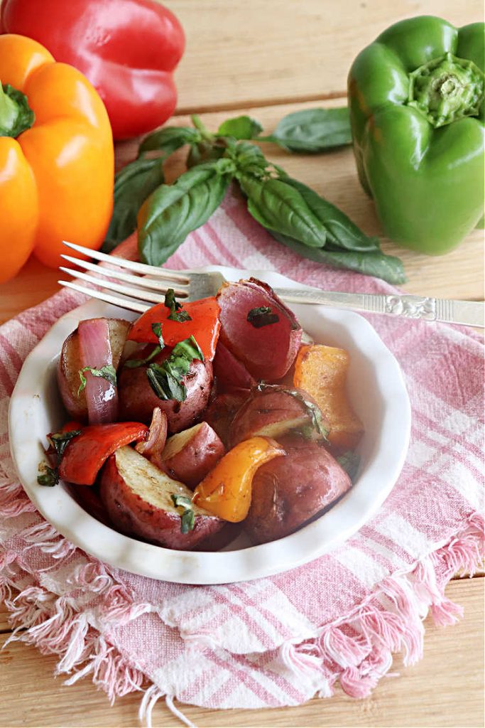 Mediterranean-Style Roasted Vegetables | Can't Stay Out of the Kitchen | this fantastic #RoastedVegetables #recipe is the perfect accompaniment to #fish, #steaks, #PorkChops or #LambChops. It's easy to toss together for weeknight dinners too. The combination of flavors is so mouthwatering & irresistible, you'll want seconds! #RedPotatoes #vegetables #BellPeppers #basil #Mediterranean #GlutenFree #vegan 
#LowCalorie #healthy
#MediterraneanStyleRoastedVegetables