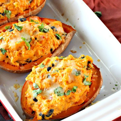 Mexican Stuffed Sweet Potatoes | I LOVE these mouthwatering #sweetpotatoes! They're hearty, filling and substantial enough for #MeatlessMondays. This #TexMex version is so flavorful & sumptuous you won't want to stop eating them. I sure didn't. Healthy, clean-eating #glutenfree #CincoDeMayo