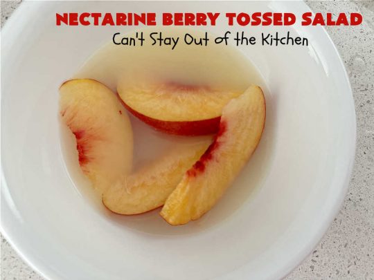 Nectarine Berry Tossed Salad | Can't Stay Out of the Kitchen | Captivate your senses with this fantastic #TossedSalad #recipe. It includes #nectarines, #blueberries, #raspberries, #FetaCheese, #HoneyRoastedPecans (roasted in butter!), & a delicious homemade #SaladDressing that also includes #nectarines & #healthy ingredients. #GlutenFree #salad #NectarineBerryTossedSalad