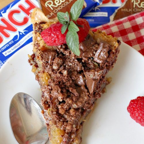 Nestle's Crunch Pie | Can't Stay Out of the Kitchen | this spectacular #pie is filled with #NestlesCrunchBars! It has that smooth milk #chocolate taste with a little crunch added to make it special. Every bite is a chocolaty delight. Terrific for company, #holidays like #ValentinesDay or special occasions. #Nestles #dessert #HolidayDessert #ChocolateDessert #NestlesCrunchPie